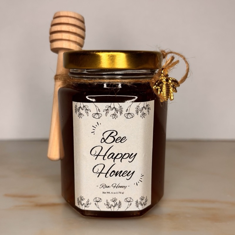 Jar of Bee Happy Honey raw local honey